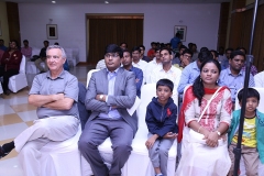 MD with client and family